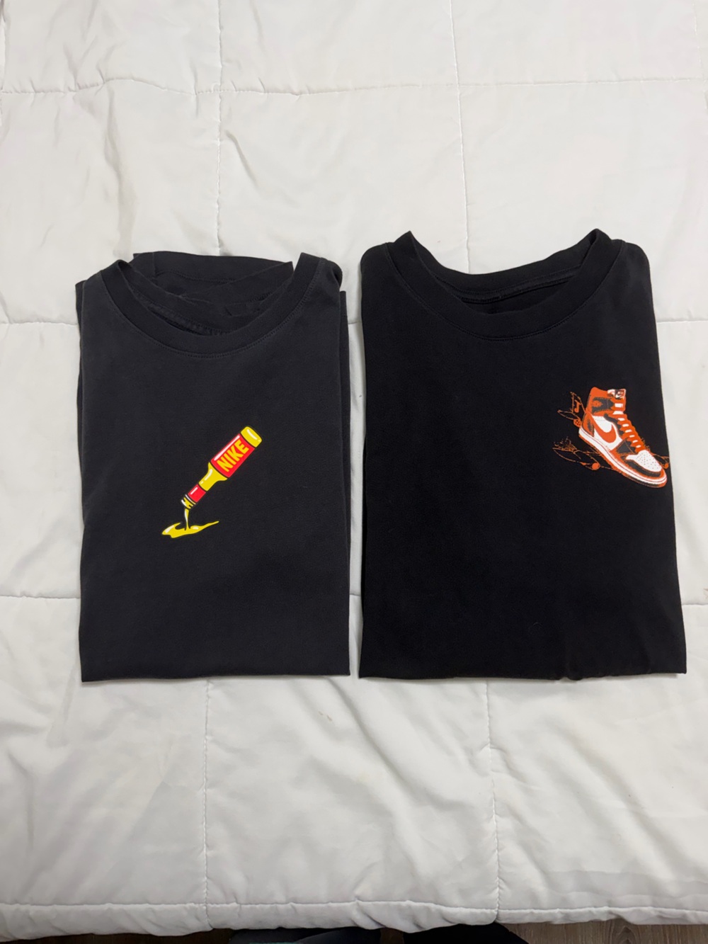 Nike Men’s Black Tee with Orange Sneaker & Yellow Bottle Graphics